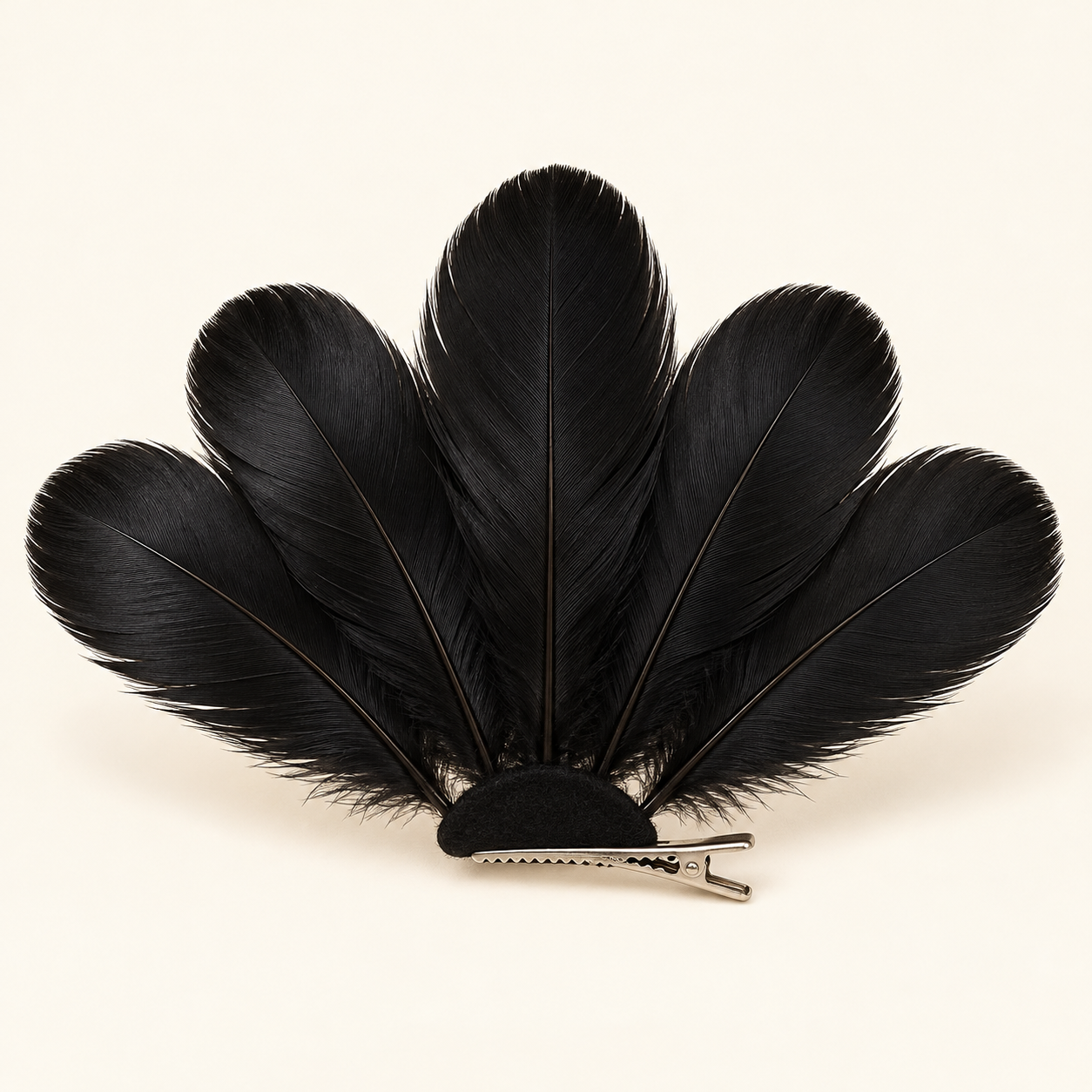 Sombra Fan: Five broad black feathers open into a fan silhouette.